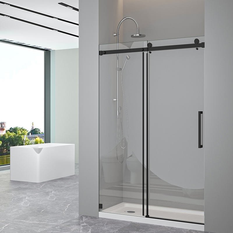 Anhe frameless glass shower door in a contemporary hotel suite
